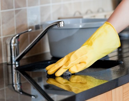 Cleaning team working in a communal area with access considerations